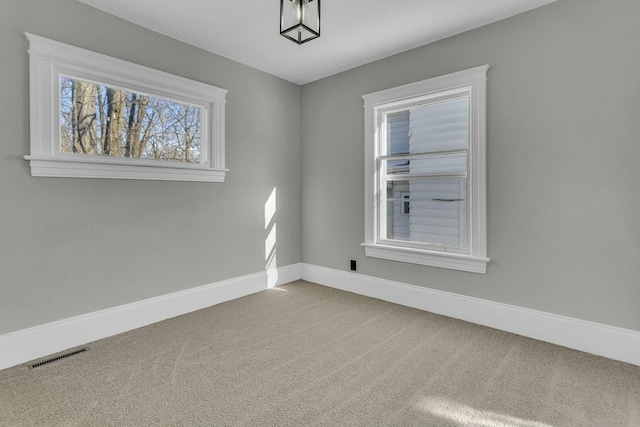 view of carpeted spare room