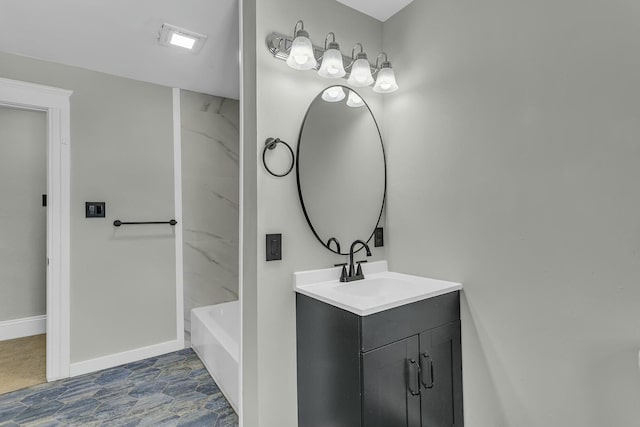 bathroom with a tub to relax in and vanity