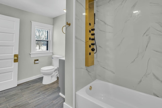 bathroom featuring toilet and washtub / shower combination