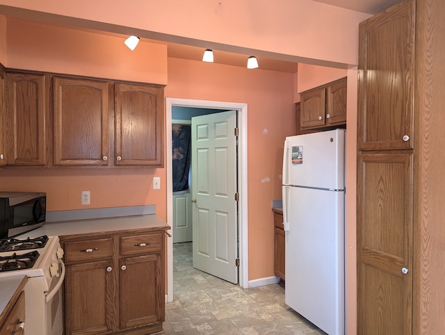 kitchen featuring white appliances