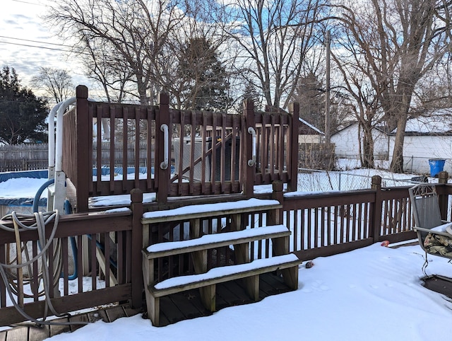 view of snow covered deck