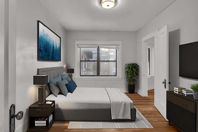 bedroom featuring hardwood / wood-style flooring