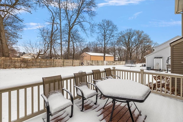 view of snow covered deck