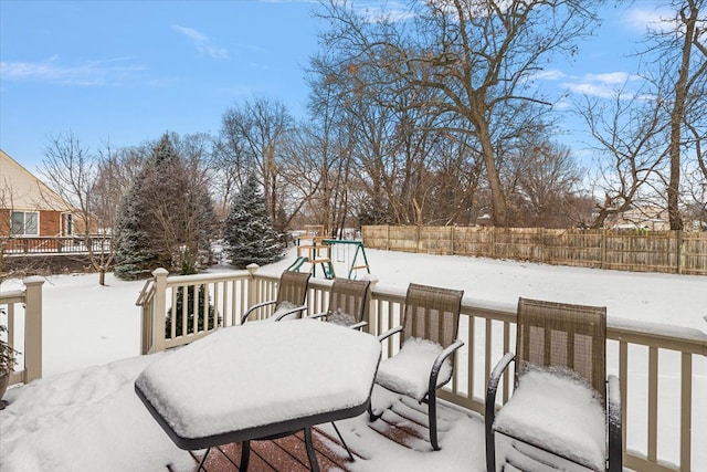 view of snow covered deck