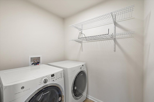 laundry room featuring washer and dryer