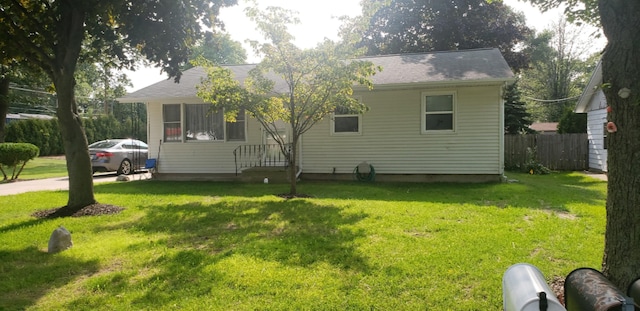 exterior space with a lawn