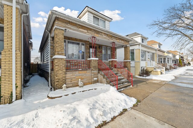 view of front of home featuring covered porch