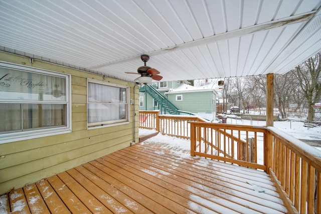 snow covered deck with ceiling fan