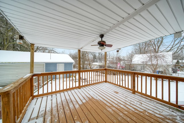 snow covered deck featuring ceiling fan