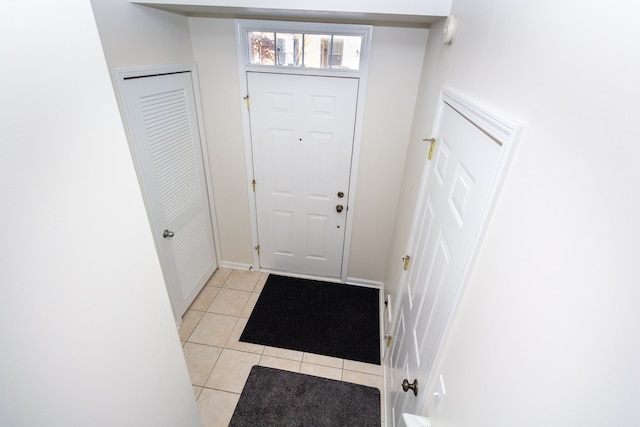 view of tiled foyer entrance