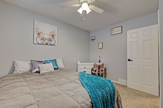 carpeted bedroom with ceiling fan