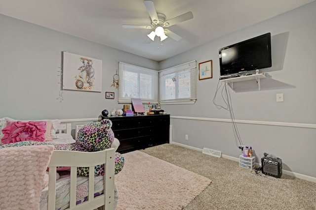 bedroom with ceiling fan and carpet floors