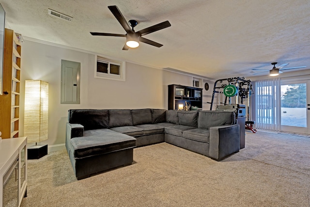 carpeted living room with ceiling fan, a textured ceiling, and electric panel