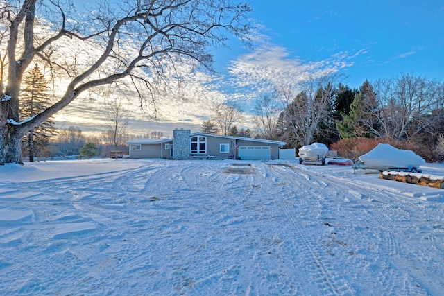 view of front of property featuring a garage