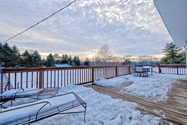 view of snow covered deck