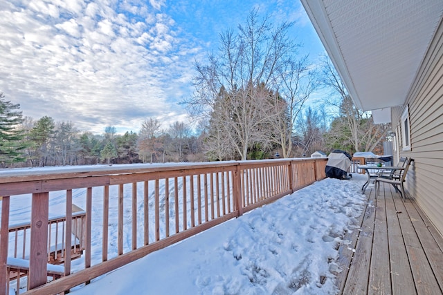 view of snow covered deck