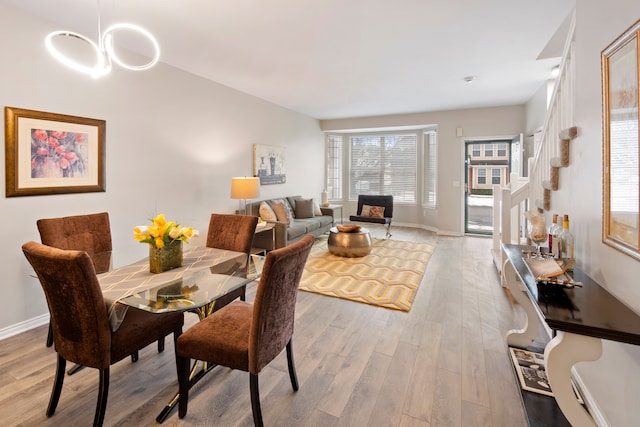 dining room with light wood-type flooring