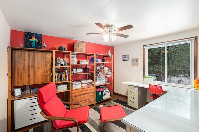 home office featuring ceiling fan and dark hardwood / wood-style flooring