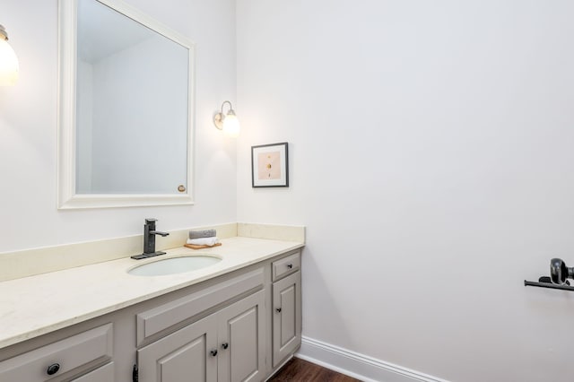 bathroom featuring vanity and hardwood / wood-style flooring