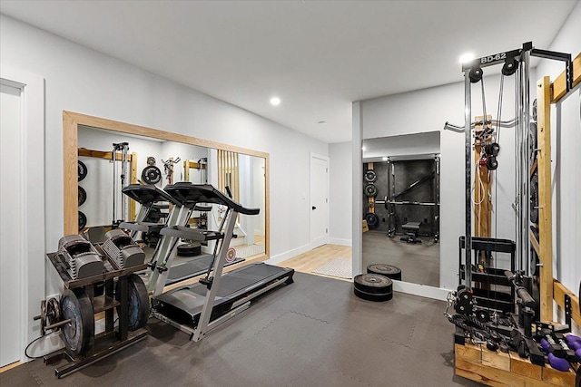 workout area with recessed lighting and baseboards