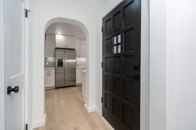 corridor featuring light hardwood / wood-style flooring