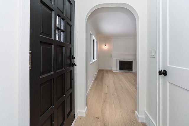 hallway with light wood-type flooring