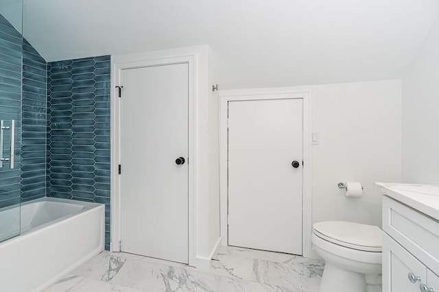 full bathroom featuring tub / shower combination, toilet, vanity, and vaulted ceiling