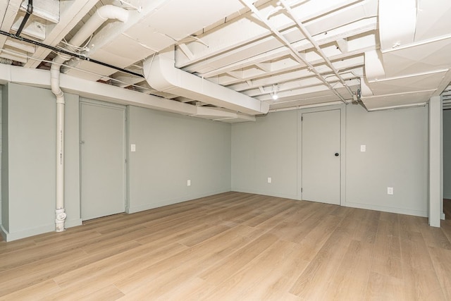 basement with light wood-type flooring