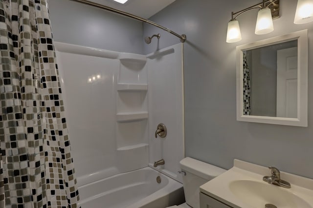 full bathroom with toilet, vanity, and shower / tub combo