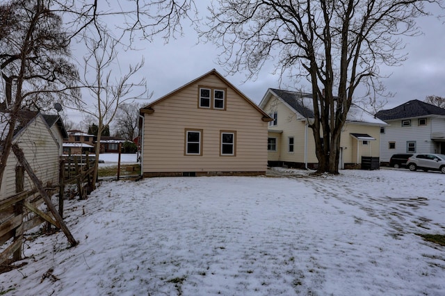 view of snow covered property