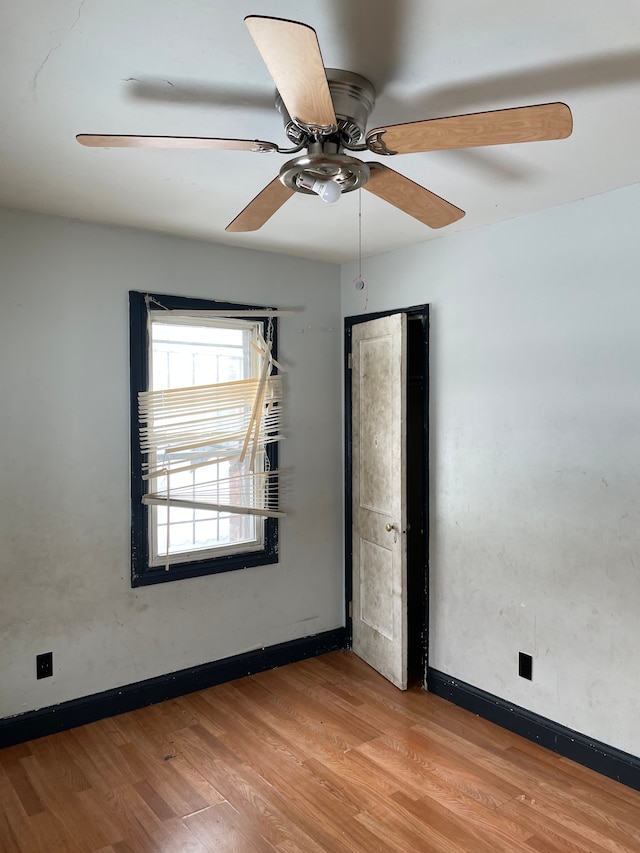 spare room with light hardwood / wood-style flooring