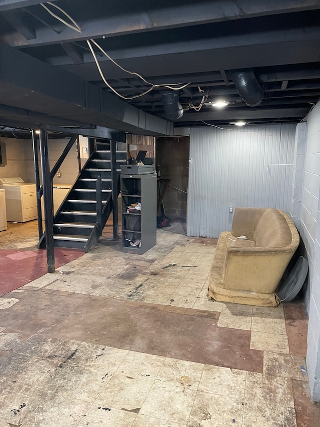 basement with washer and clothes dryer