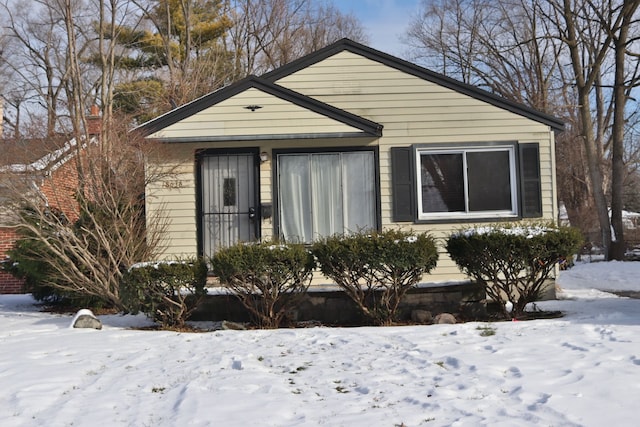 view of snow covered property