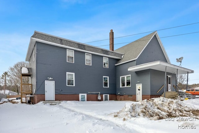 view of snow covered property