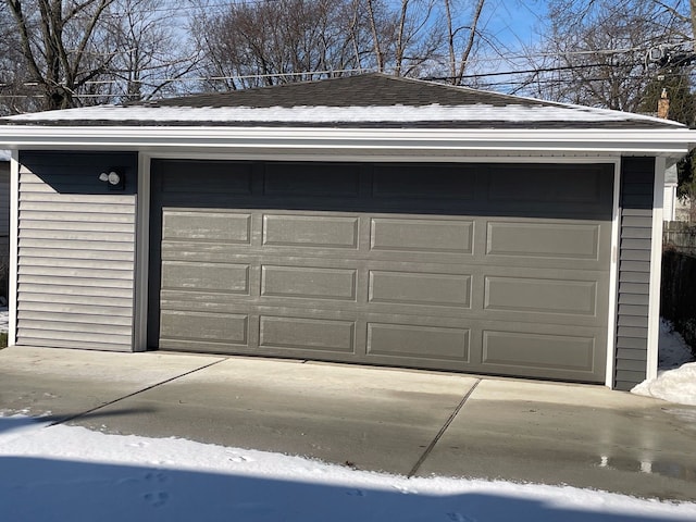 view of snow covered garage