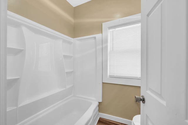 bathroom featuring toilet and hardwood / wood-style flooring