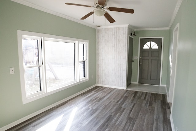 entryway featuring dark hardwood / wood-style floors and crown molding