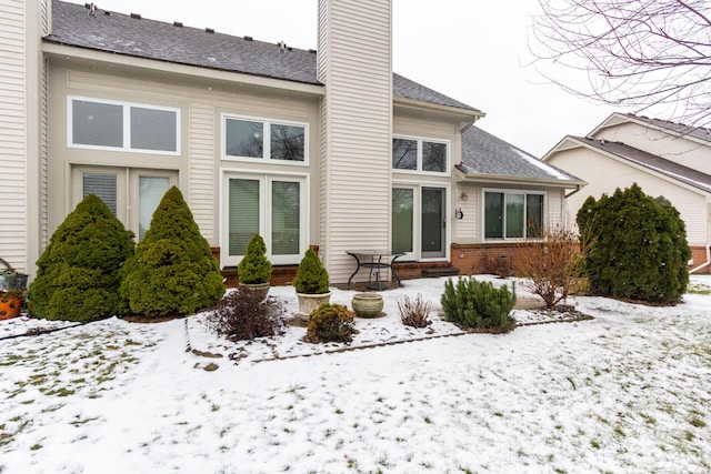 view of snow covered property