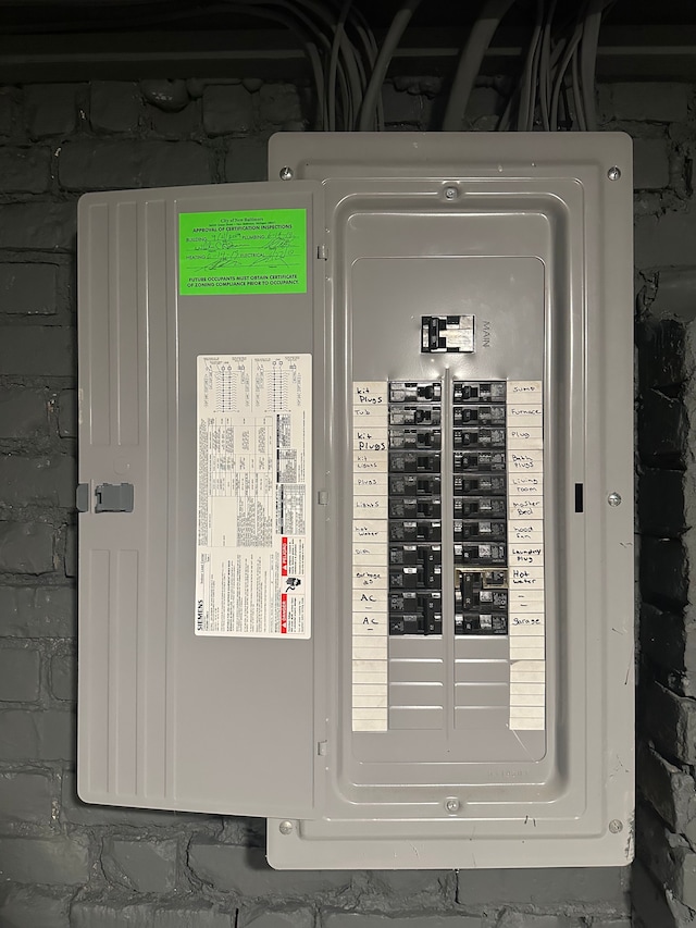 utility room with electric panel