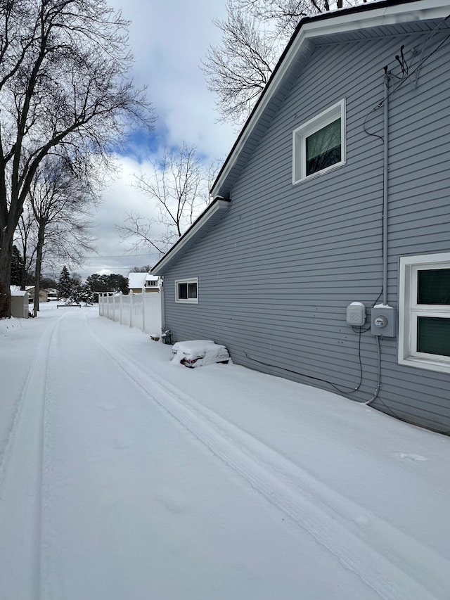 view of snow covered property