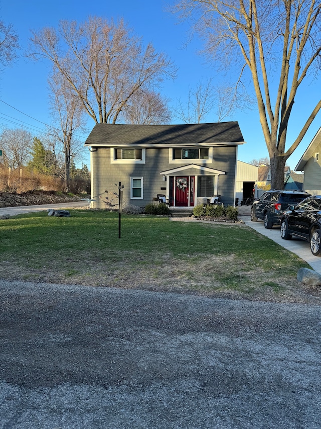 view of front of home with a front lawn