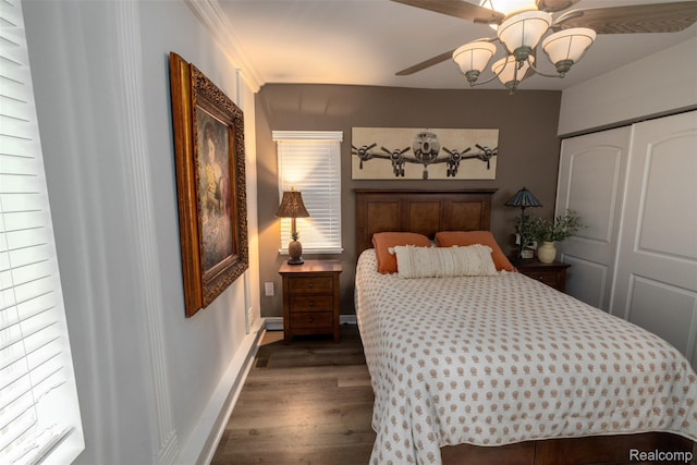 50848 Ashley St, New Baltimore, MI 48047 - bedroom with wood finished floors, a closet, baseboards, and a ceiling fan
