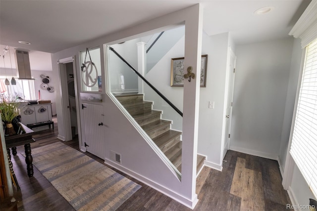 50848 Ashley St, New Baltimore, MI 48047 - stairs featuring wood finished floors and baseboards