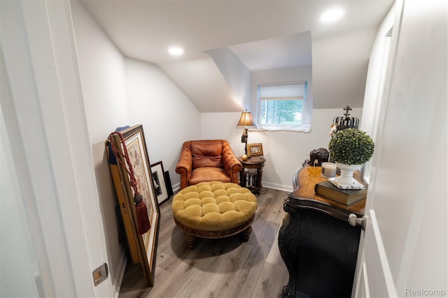 50848 Ashley St, New Baltimore, MI 48047 - living area with wood finished floors, lofted ceiling, recessed lighting, and baseboards