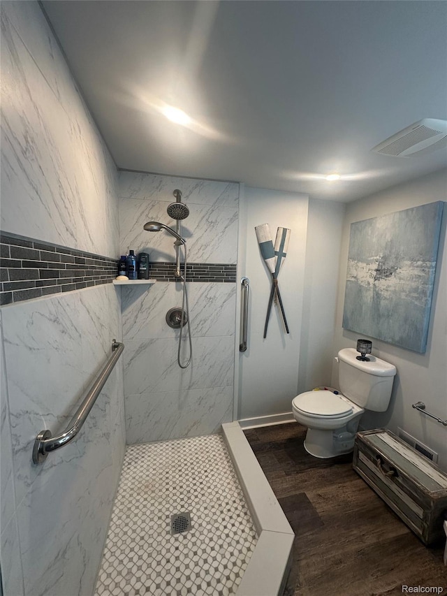 50848 Ashley St, New Baltimore, MI 48047 - bathroom with a marble finish shower, toilet, and wood finished floors