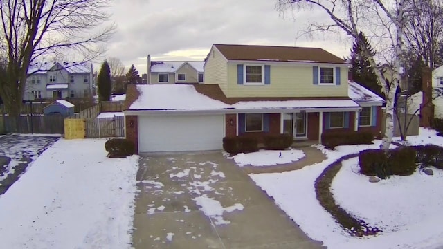 view of front property with a garage