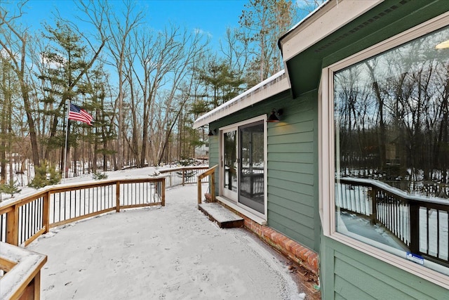 view of snow covered deck