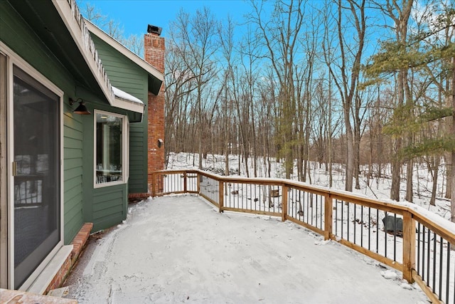 view of snow covered deck