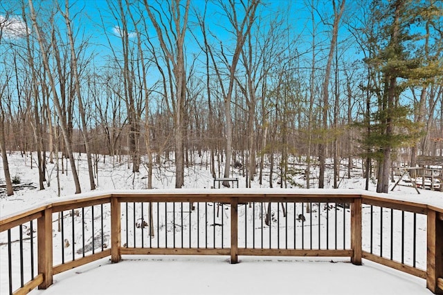 view of snow covered deck