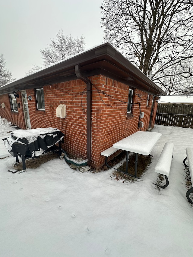 view of snow covered property